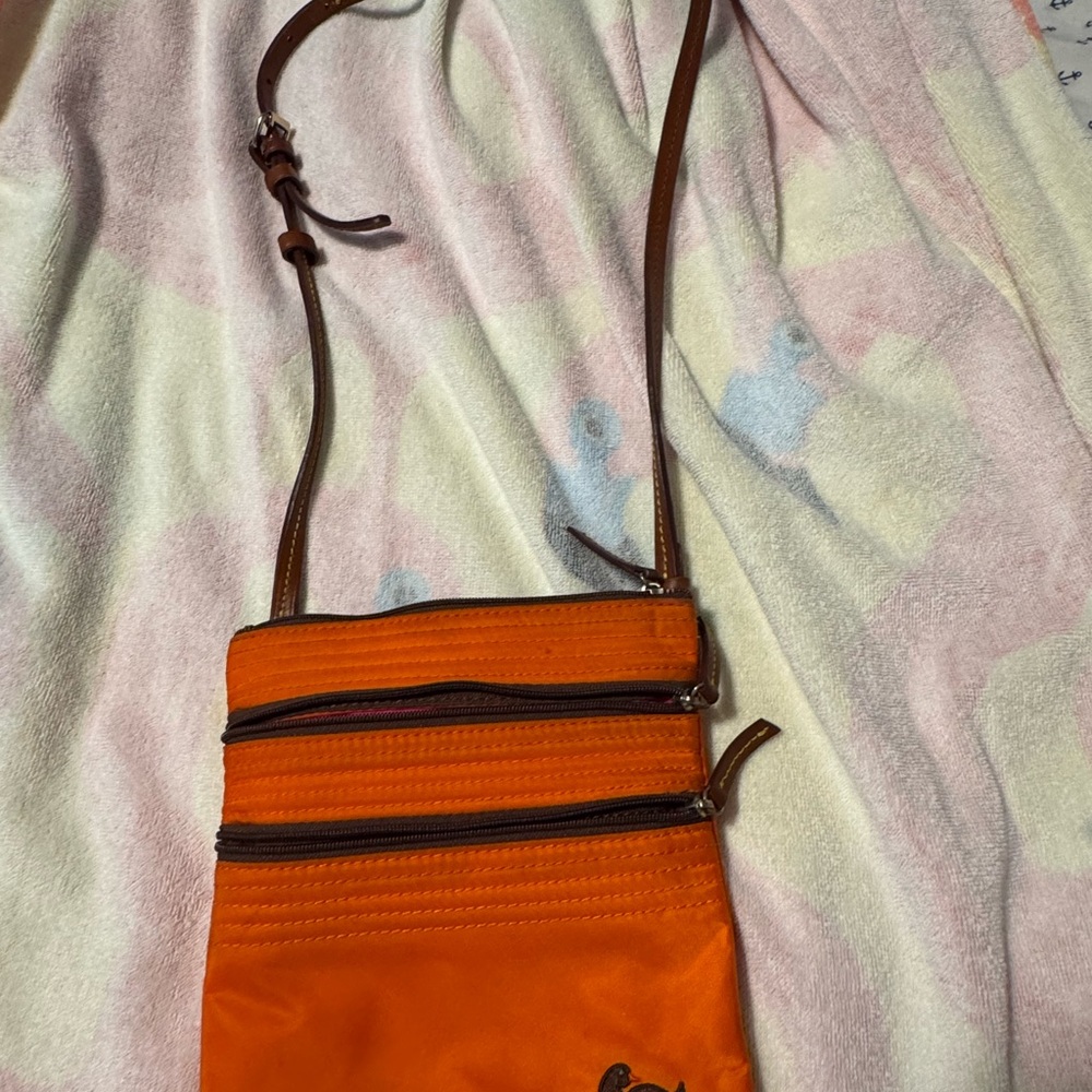 Donney and Burke small  Crossbody Bag with Brown Straps.